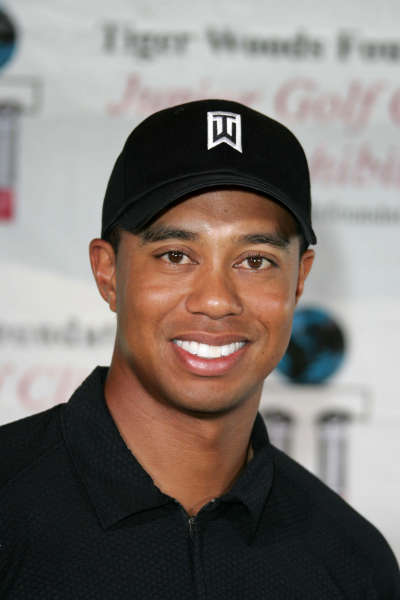 Tiger Woods in a black hat